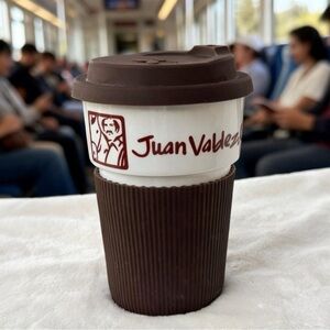 Juan Valdez Coffee travel Cup with Brown Lid and  a matching ribbed sleeve